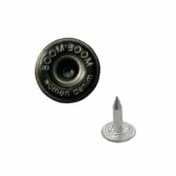 a jeans button with contrast tin color with a nail