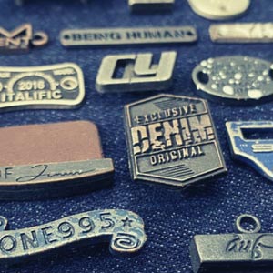 zamak metal plates on denim fabric